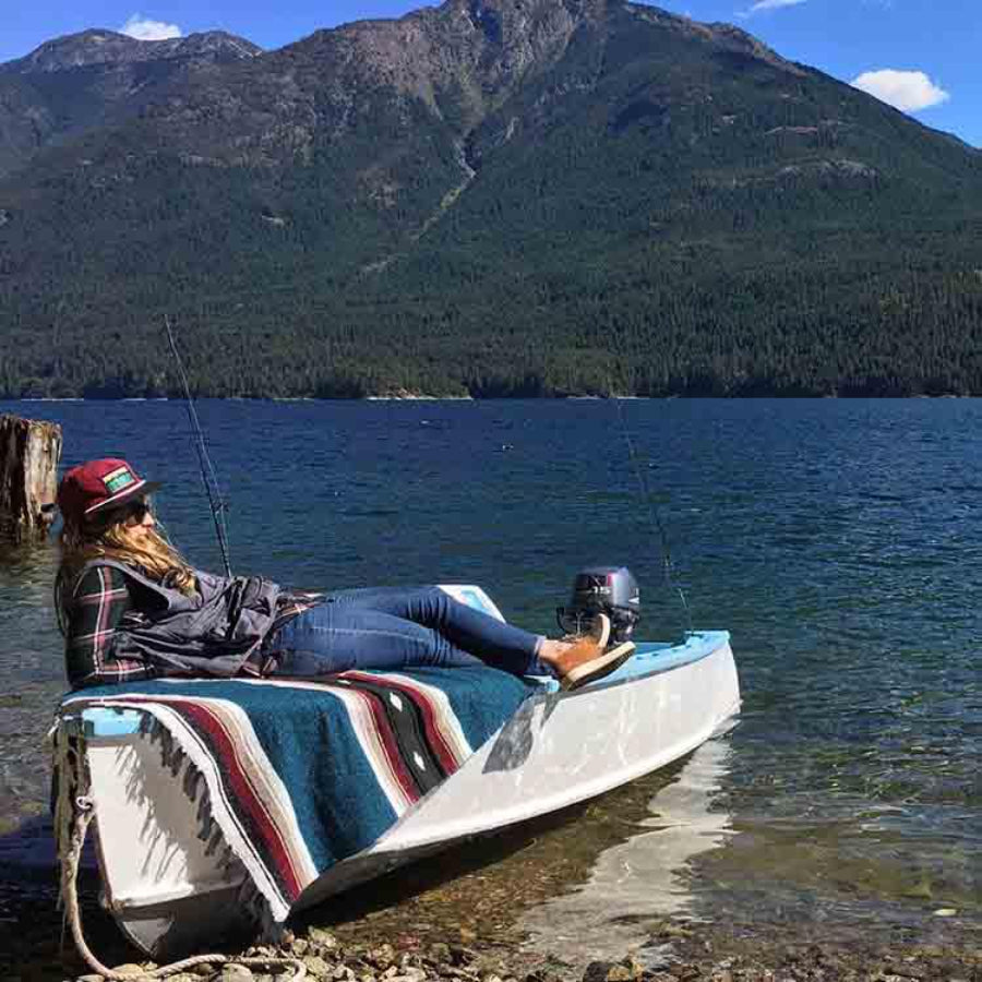 Relaxing beachside on boat with blue Mexican diamond blanket